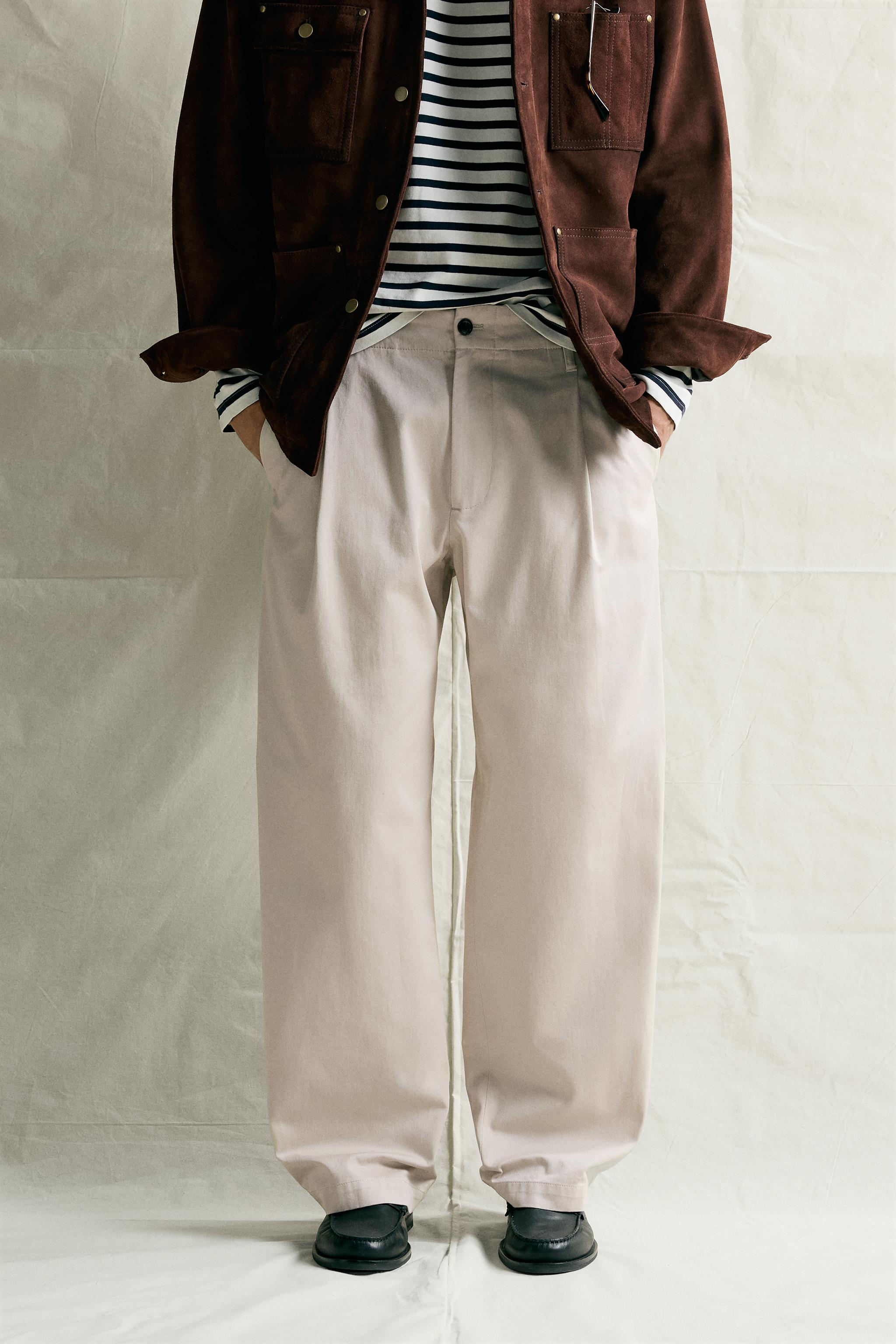 RELAXED FIT PLEATED CHINO PANTS